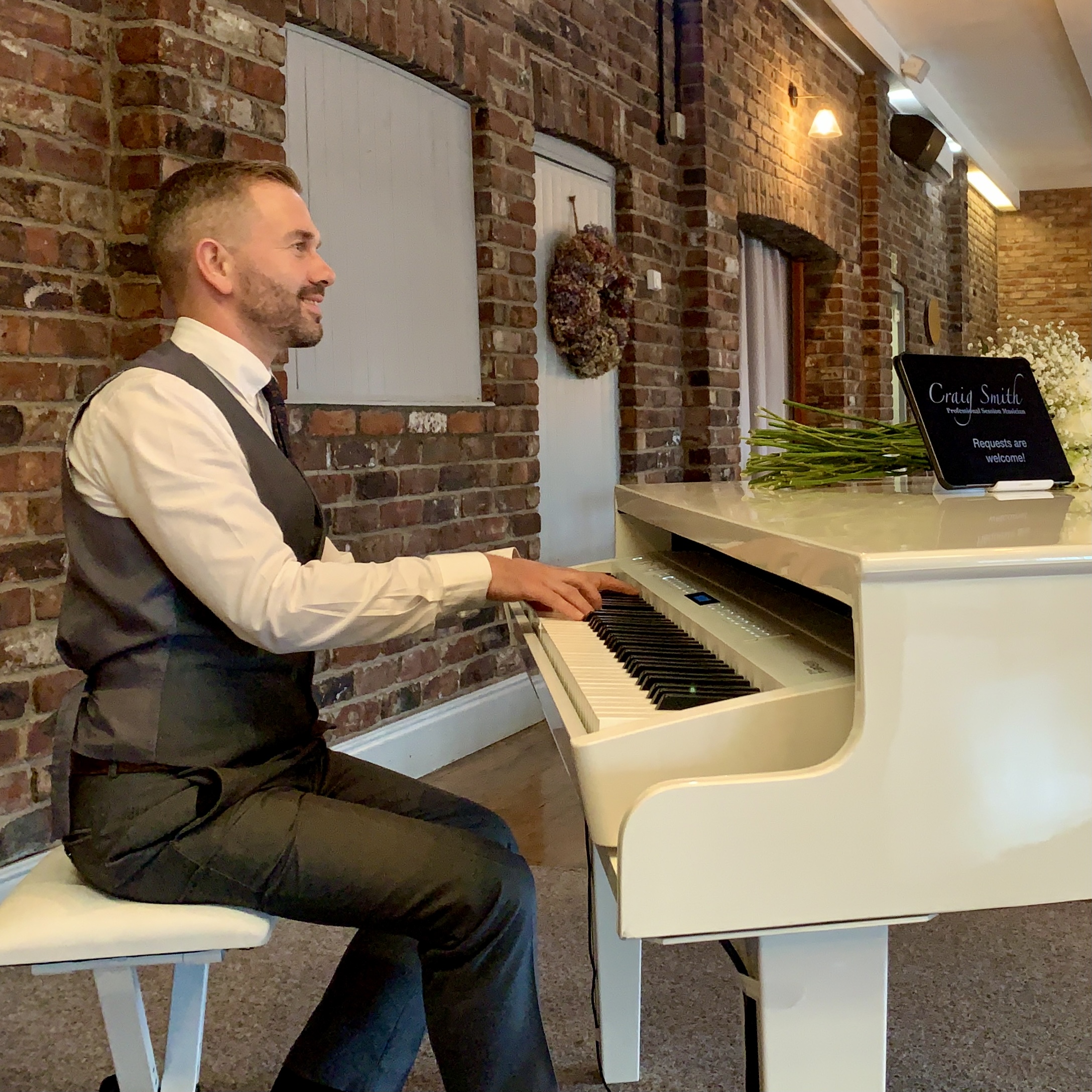 Craig Smith playing wedding piano for Larkspur Lodge